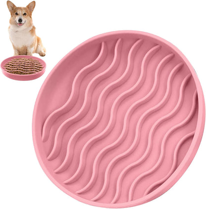 Pink silicone slow feeder dog bowl with wavy raised ridges
